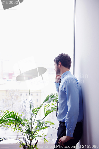 Image of business man talking by cellphone