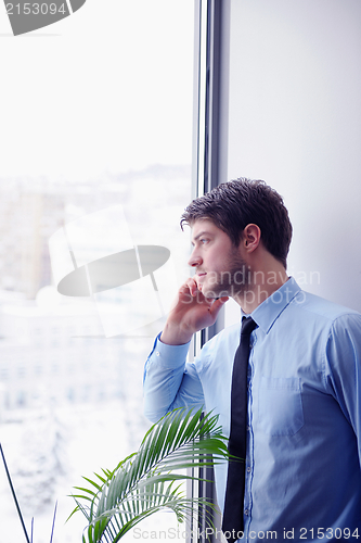 Image of business man talking by cellphone