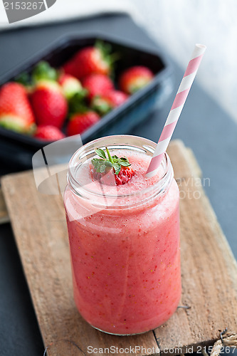 Image of Fruit smoothie and strawberries