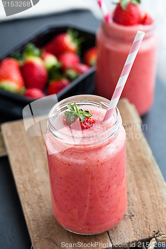 Image of Fruit smoothie and strawberries