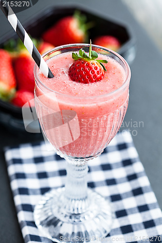 Image of Fruit smoothie and strawberries