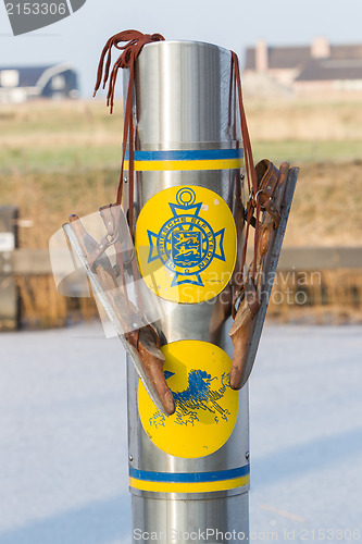 Image of Old wooden ice skates hanging at the finish of the Dutch Elfsted