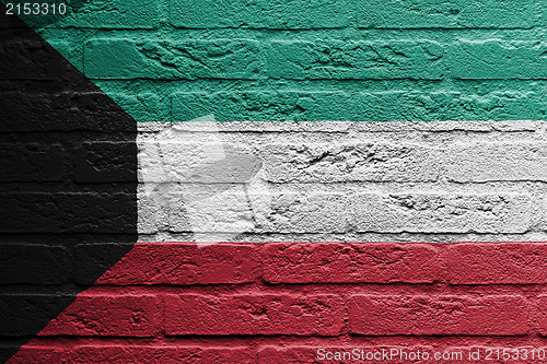 Image of Brick wall with a painting of a flag, Kuwait