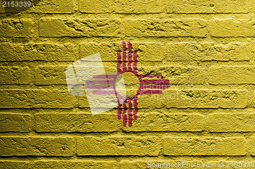 Image of Brick wall with a painting of a flag, New Mexico