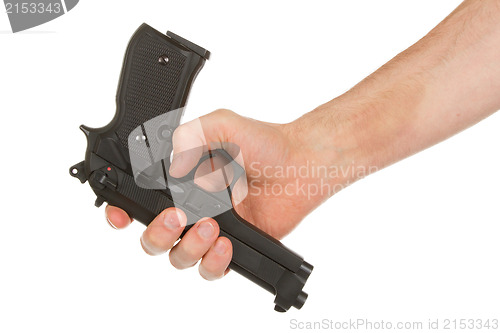 Image of Disarming, hand giving a gun