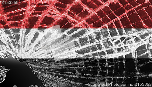 Image of Broken glass or ice with a flag, Yemen