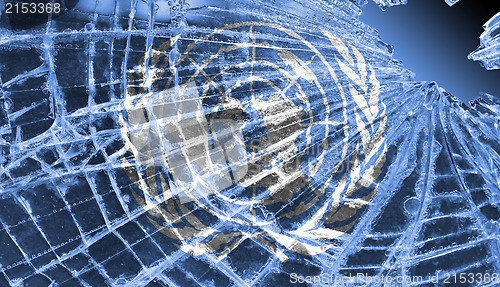 Image of Broken glass or ice with a flag, United Nations