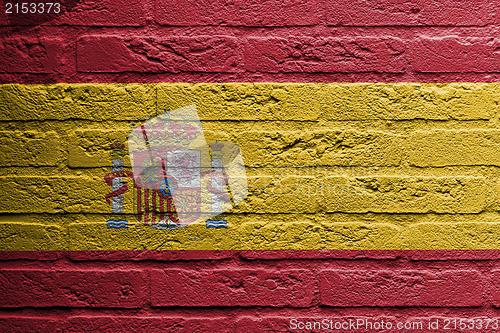 Image of Brick wall with a painting of a flag