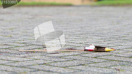 Image of Burnt-out rocket on the streets