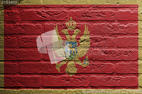 Image of Brick wall with a painting of a flag, Montenegro