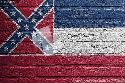 Image of Brick wall with a painting of a flag, Mississippi