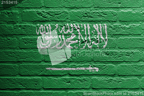 Image of Brick wall with a painting of a flag, Saudi Arabia