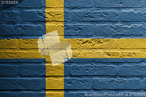 Image of Brick wall with a painting of a flag, Sweden