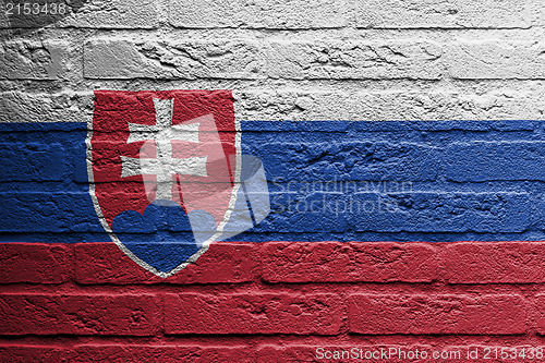 Image of Brick wall with a painting of a flag, Slovakia