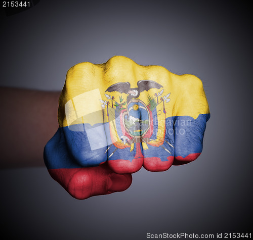 Image of Front view of punching fist on gray background