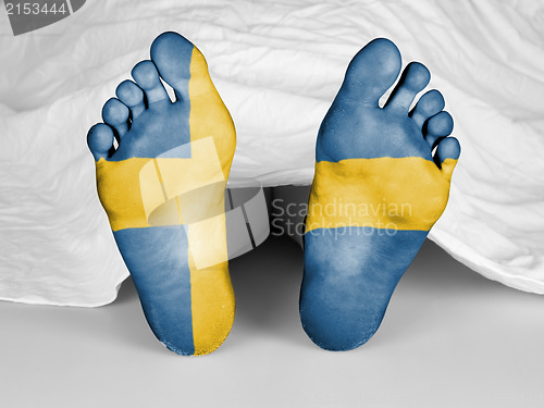 Image of Dead body under a white sheet