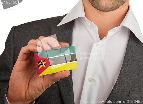 Image of Businessman is holding a business card, Mozambique