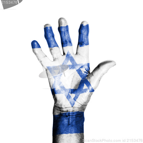 Image of Hand of an old woman, wrapped with a pattern of the flag of Isra