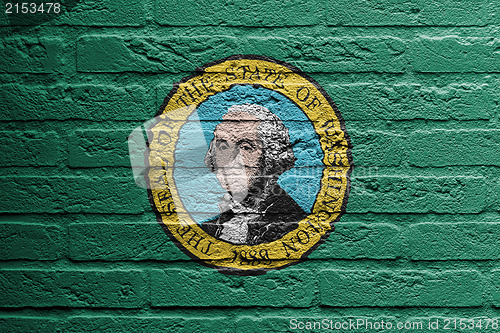 Image of Brick wall with a painting of a flag, Washington