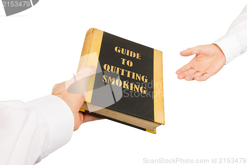 Image of Businessman giving an used book to another businessman