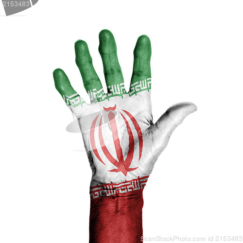 Image of Hand of an old woman, wrapped with a pattern of the flag of Iran