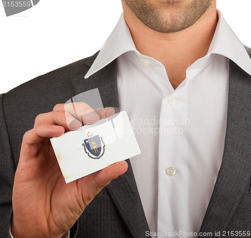 Image of Businessman is holding a business card, Massachusetts