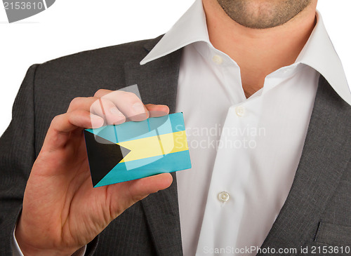 Image of Businessman is holding a business card, The Bahamas