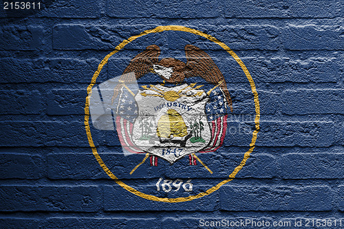 Image of Brick wall with a painting of a flag, Utah