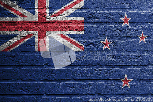Image of Brick wall with a painting of a flag, New Zealand