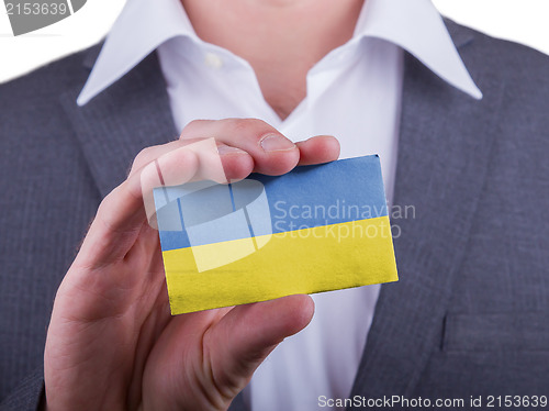 Image of Businessman showing card, matte paper effect