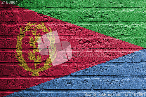 Image of Brick wall with a painting of a flag, Eritrea
