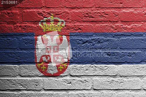 Image of Brick wall with a painting of a flag, Serbia