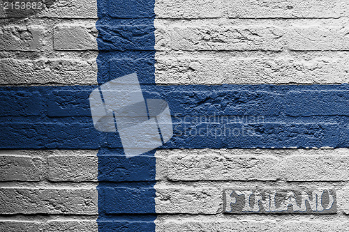 Image of Brick wall with a painting of a flag, Finland