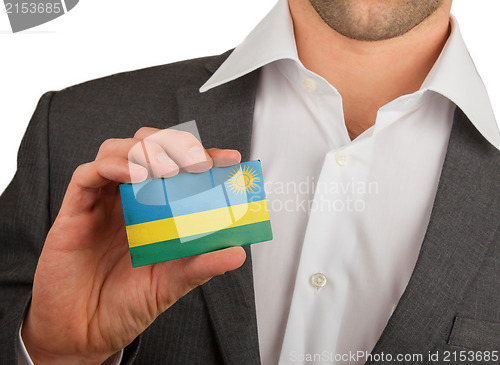 Image of Businessman is holding a business card, Rwanda