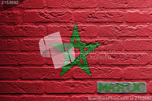 Image of Brick wall with a painting of a flag