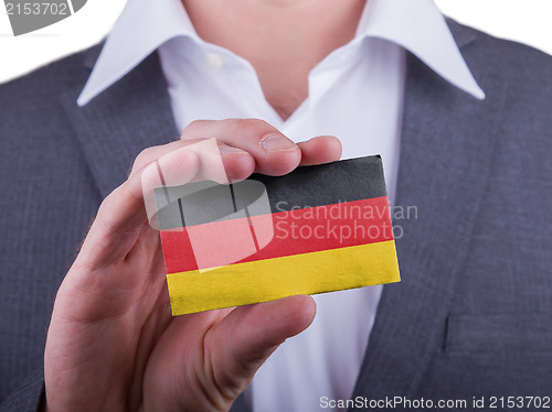 Image of Businessman showing card, matte paper effect