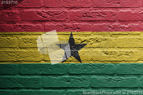 Image of Brick wall with a painting of a flag, Ghana