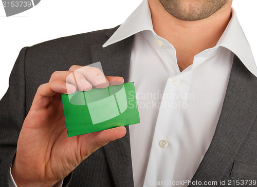 Image of Businessman is holding a business card, Libya