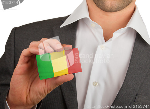 Image of Businessman is holding a business card, Mali