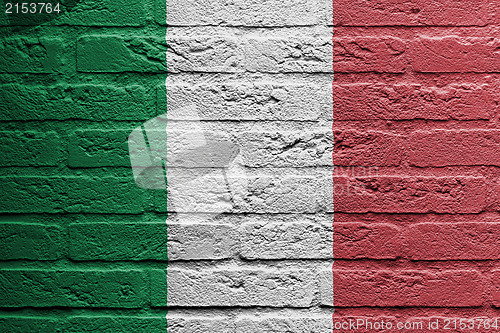 Image of Brick wall with a painting of a flag, Italy