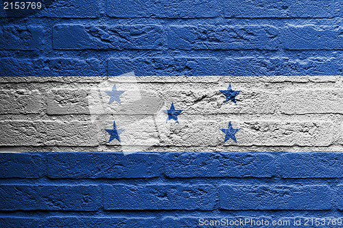 Image of Brick wall with a painting of a flag, Honduras