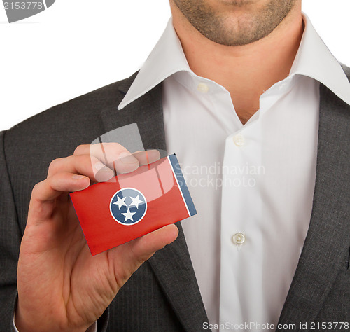 Image of Businessman is holding a business card, Tennessee