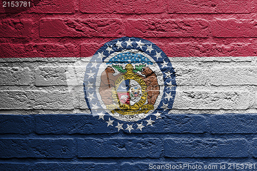 Image of Brick wall with a painting of a flag, Missouri