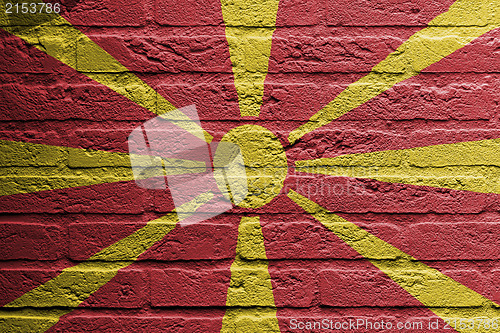 Image of Brick wall with a painting of a flag, Macedonia