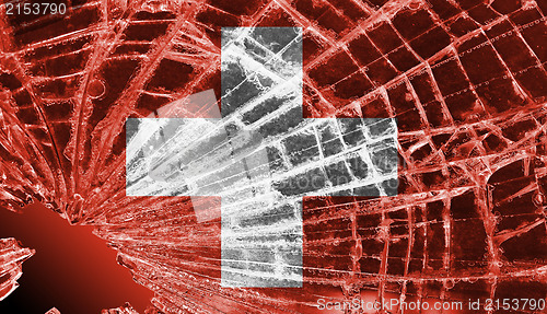 Image of Broken glass or ice with a flag, switzerland