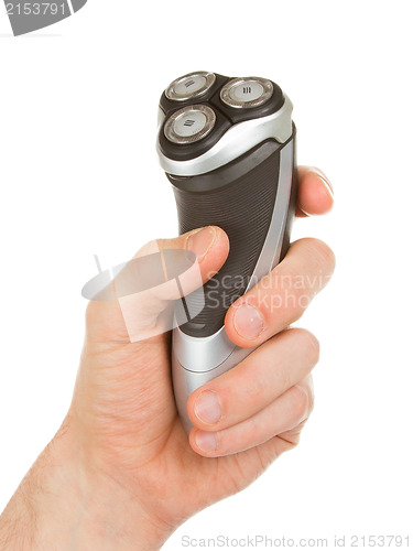 Image of Hand holding an electric shaver 