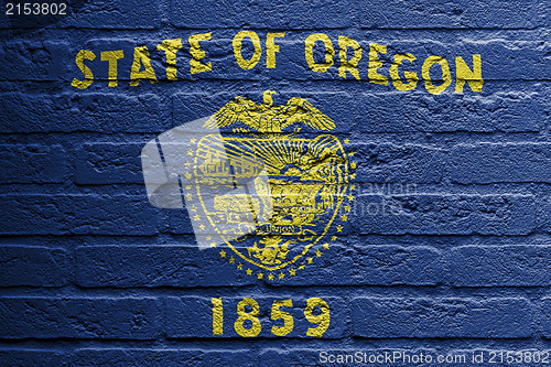 Image of Brick wall with a painting of a flag, Oregon