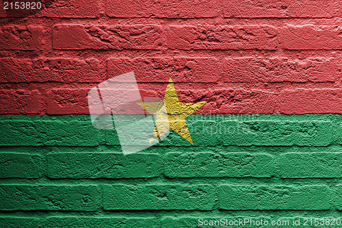 Image of Brick wall with a painting of a flag, Burkina Faso