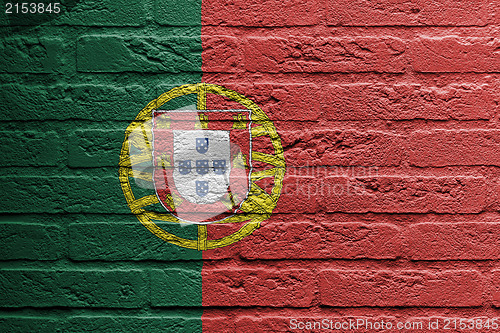 Image of Brick wall with a painting of a flag, Portugal