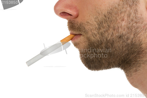 Image of Side view of a man with a cigarette